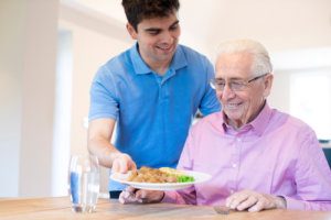 man serrving a food